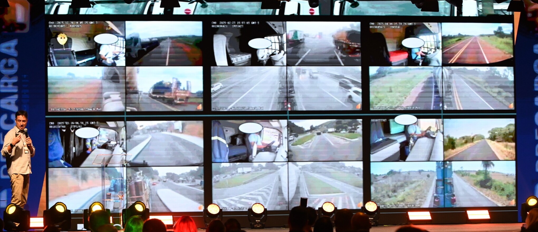 Painel de câmeras onboard de telemetria de caminhões em rodovias, durante palestra no Fórum PRECARGA